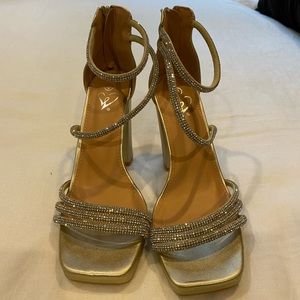 Gold strappy platform heels